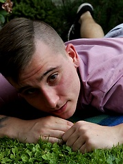 Joshua Czech lays a blanket down outside and busts a nut. by BF Collection image #8