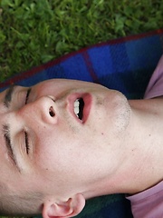 Joshua Czech lays a blanket down outside and busts a nut. by BF Collection image #8