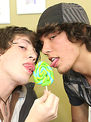 Two young homo\\\'s sucking on lollipop leads to sucking on a huge hard cock!
