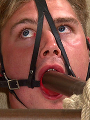 Hetero man Joel is subjected to extreme bondage at Breeder Fuckers