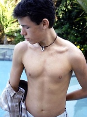 Cute twink blows a hot creamy load all over himself pool side.