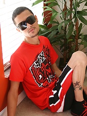 Latin twink Jesiel Alvardo stroking his hard cock.