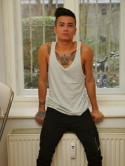 Tattooed twink Cory Prince stroking his big beautiful cock.