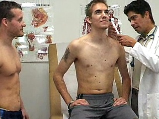 College boy and coach visit the doctor for some fun.