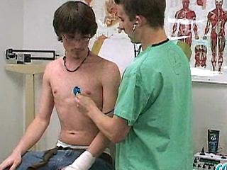 College boy gets shirtless in exam room.