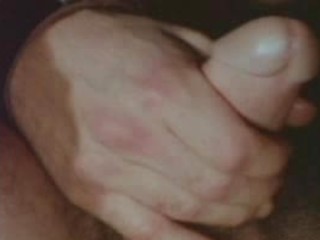 Horny leatherman strokes his massive tool to reach orgasm