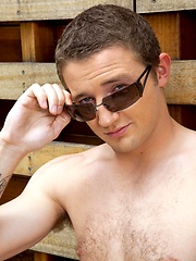 Dan strokes his huge cock by the pool by Randy Blue image #4