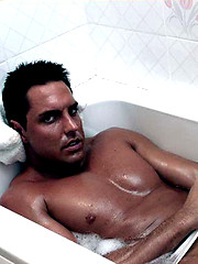 Marcello gets wet in the bath as he wanks his big cock by With Marcello image #7