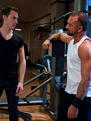 A sexy stud endures a brutal bondage workout including flogging, electro, and a hard suspension fuck from a sadistic trainer with an enormous cock. by Bound Gods image #10