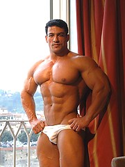 Tarek posing outdoors by Muscle Gallery image #8
