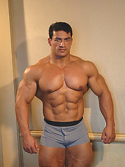 Tarek posing outdoors by Muscle Gallery image #8