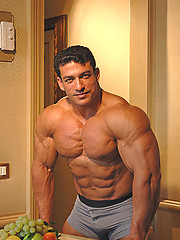Tarek posing outdoors by Muscle Gallery image #8