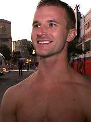 A sexy stud is stripped naked, humiliated and gang fucked in front of a cheering crowd. by Bound in Public image #12