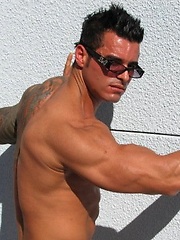 Jock poses outside and jerks off on bed by Mark Wolff image #6