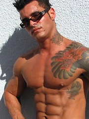 Jock poses outside and jerks off on bed by Mark Wolff image #6