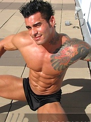Jock poses outside and jerks off on bed by Mark Wolff image #6