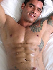 Jock poses outside and jerks off on bed by Mark Wolff image #6