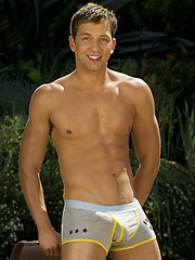 Jonathan Lowe posing naked outdoors by Colt Studio image #5