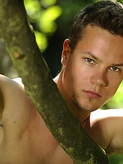 Cute boy posing naked outdoors by William Higgins image #4
