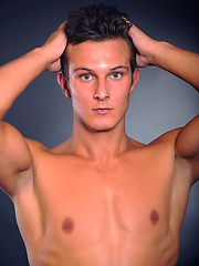 Hot brunette stud posing naked and shows his butt by William Higgins image #6