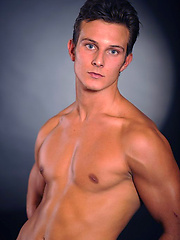Hot brunette stud posing naked and shows his butt by William Higgins image #6