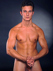 Hot brunette stud posing naked and shows his butt by William Higgins image #6