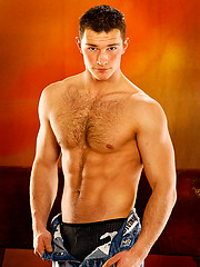 Muscle man shows his perfect hairy ches and uncut boner by William Higgins image #8