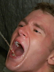 Cole Brooks gets piss in the mouth by Girth Brooks and licks his cum off the dirty floor. by Bound in Public image #9