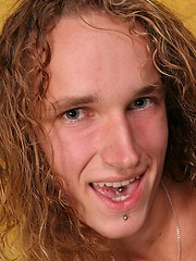 Long hair twink jacking off by East Boys image #6