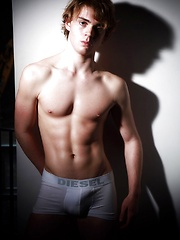 Gabriel posing in studio by Male Model image #10