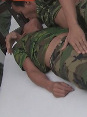 Soldiers get hot and horny with each other while on duty in their delicious green uniforms. by Gay Asian Piss image #7