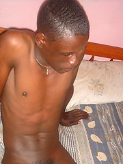 Genuine African lad, with a huge uncut cock, goes solo for our pleasure. by 80gays image #6