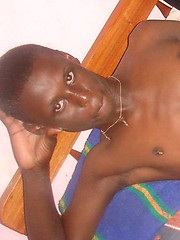 Genuine African lad, with a huge uncut cock, goes solo for our pleasure. by 80gays image #6