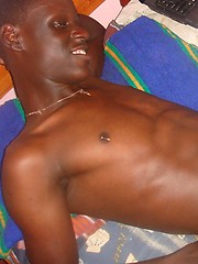 Genuine African lad, with a huge uncut cock, goes solo for our pleasure. by 80gays image #6