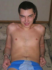 He peels off his sweet blue undies to reveal a great uncut cock. by EU Twinks image #5