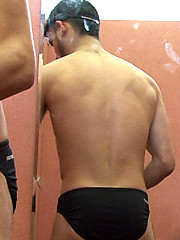 Horny young man entering a swimming pool cubicle to change for a swim. by Sneaky Peek image #5