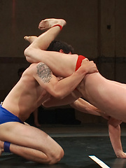 Two studs going at it, a prelim for the tag team match. by Naked Kombat image #4