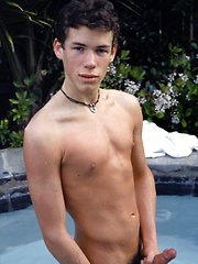 Cute twink blows a hot creamy load all over himself pool side. by Mount Equinox image #6