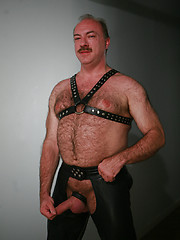 Jeremy Todd in a lether gear strokes his uncut mature cock by Pantheon Bear image #8