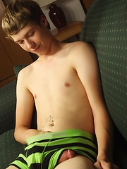 Smooth twink Levi Lee tugs on his hard cock. by BF Collection image #7