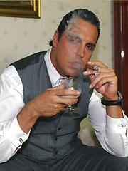 Marcello winds down by smoking a big cigar and taking off his leather shoes, before cumming inside a brandy glass by With Marcello image #9