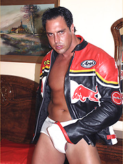 Biker boy Marcello loves the feeling of leather against his hunky body, and spunks his load all over his chest by With Marcello image #8