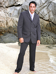 Marcello wearing a soaking wet business suit wanking on the rocks by With Marcello image #10