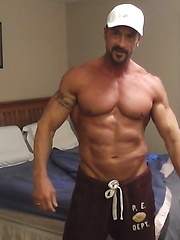 Muscular guy plays with his cock & cums by ChaosMen image #11