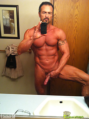 Muscular guy plays with his cock & cums by ChaosMen image #11