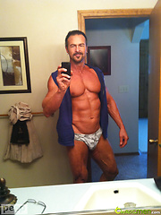 Muscular guy plays with his cock & cums by ChaosMen image #11