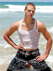 Stanley shows his perfect young muscled body on a beach by Enigmatic Boys image #7