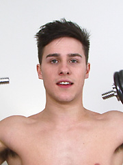 Young guy picks up a dumbbell by English Lads image #3