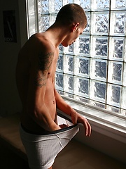 Athletic boy Eric strokes his thick hard cock. by BF Collection image #5