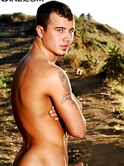 Nick posing naked outdoors by Playgirl image #4